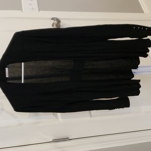 Womens long black sweater size S. Button accents on sleeves. EUC.